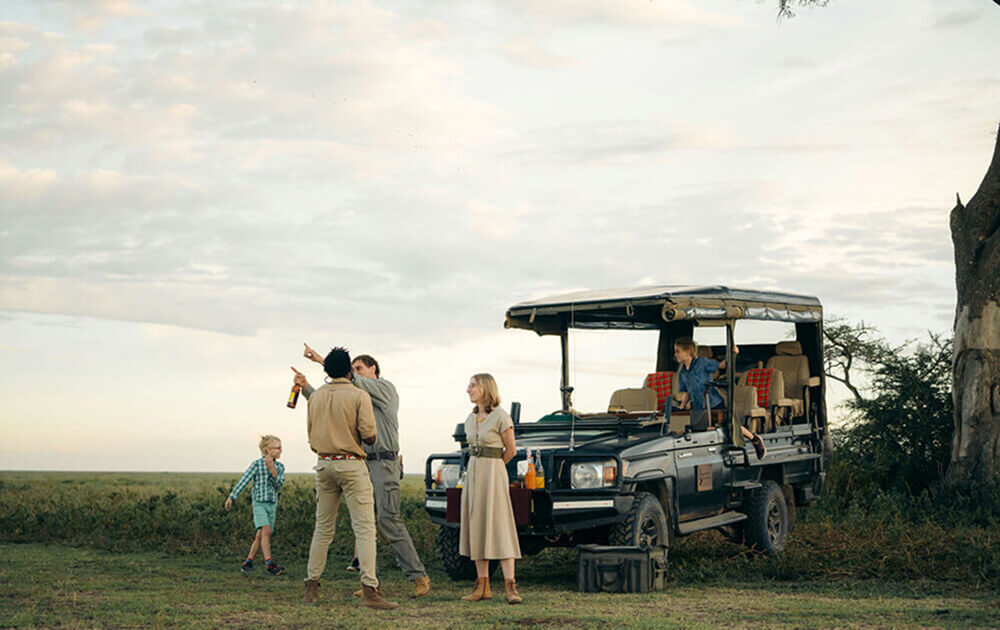A family on safari during golden hour